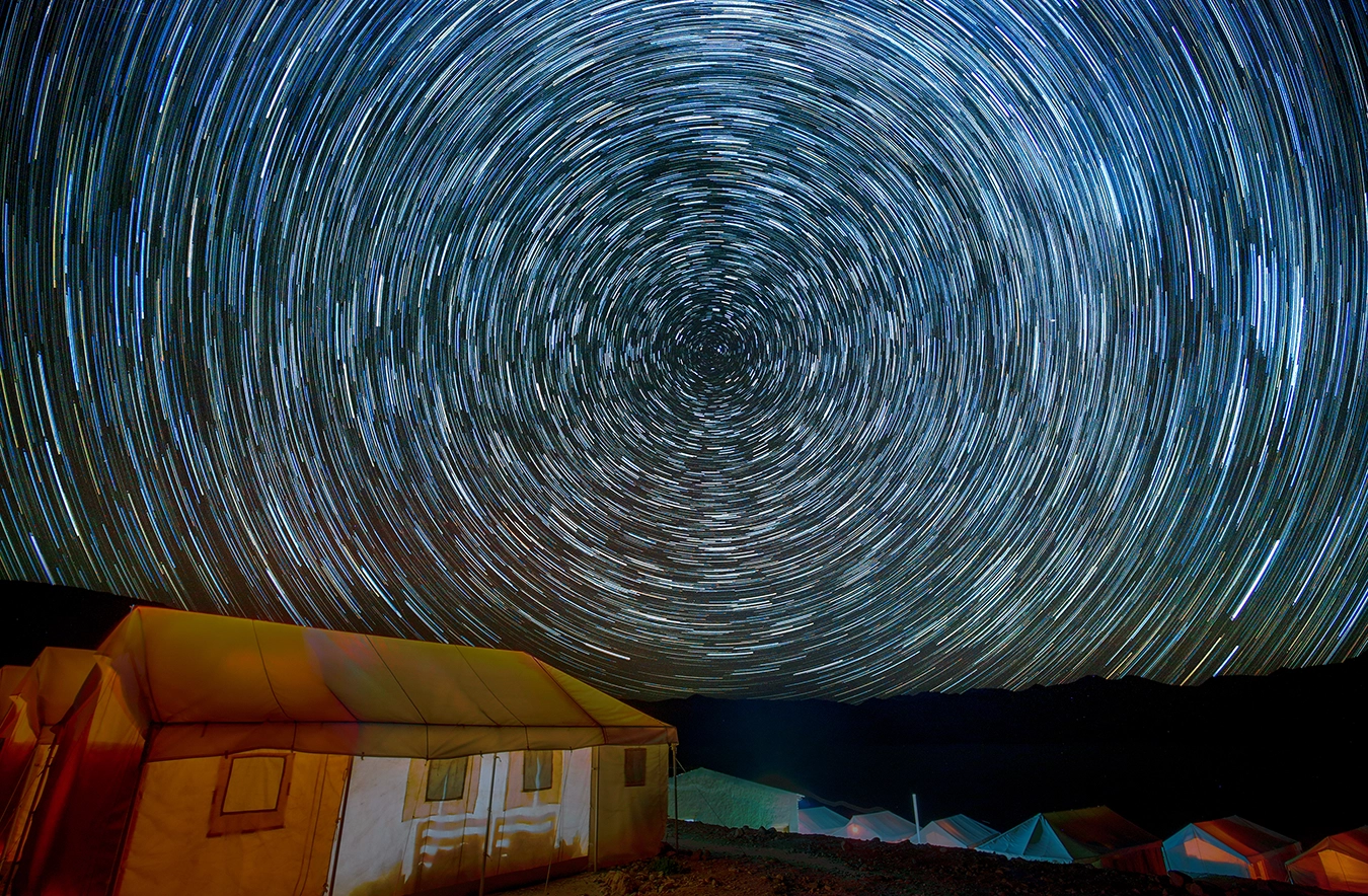 complete star trail over camps at pangong lake, Ladakh