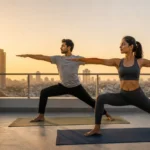Indian couple practicing yoga at sunrise showing benefits of yoga for Indians