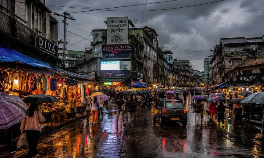 Shillong street market in monsoon rain as the vibrant urban base for Meghalaya monsoon travel