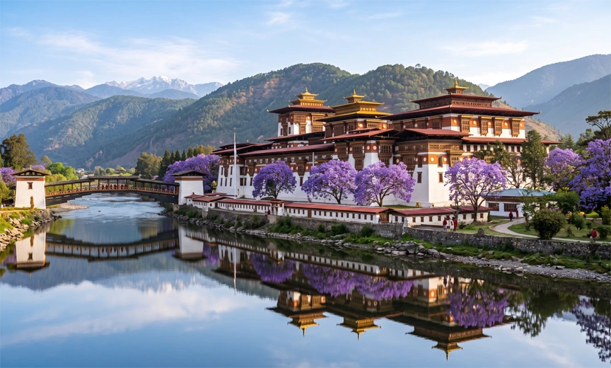 Scenic Paro Valley in Bhutan with traditional villages, mountains, and farmland.